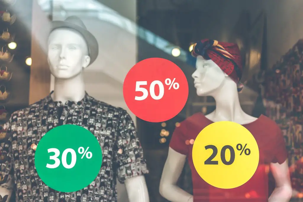 two male and female mannequin wearing clothes-Clothing discount