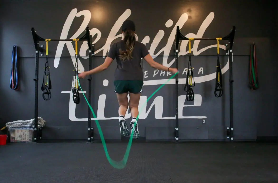 Photo by Element5 Digital woman using jumping rope