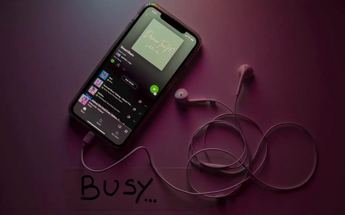 Photo by Imtiyaz Ali black android smartphone on white surface